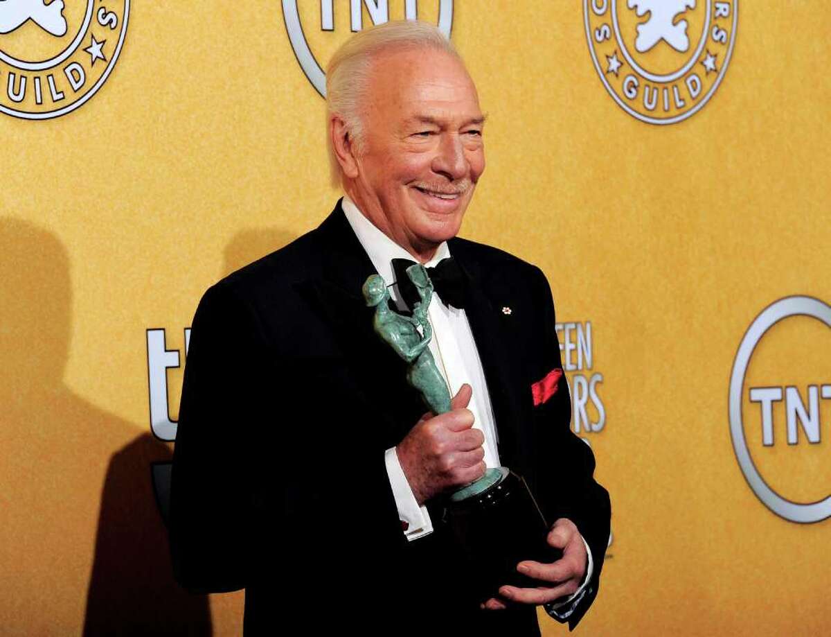 Christopher Plummer poses backstage with the award for outstanding performance by a male actor in a supporting role for "Beginners" at the 18th Annual Screen Actors Guild Awards on Sunday Jan. 29, 2012 in Los Angeles. (AP Photo/Chris Pizzello)