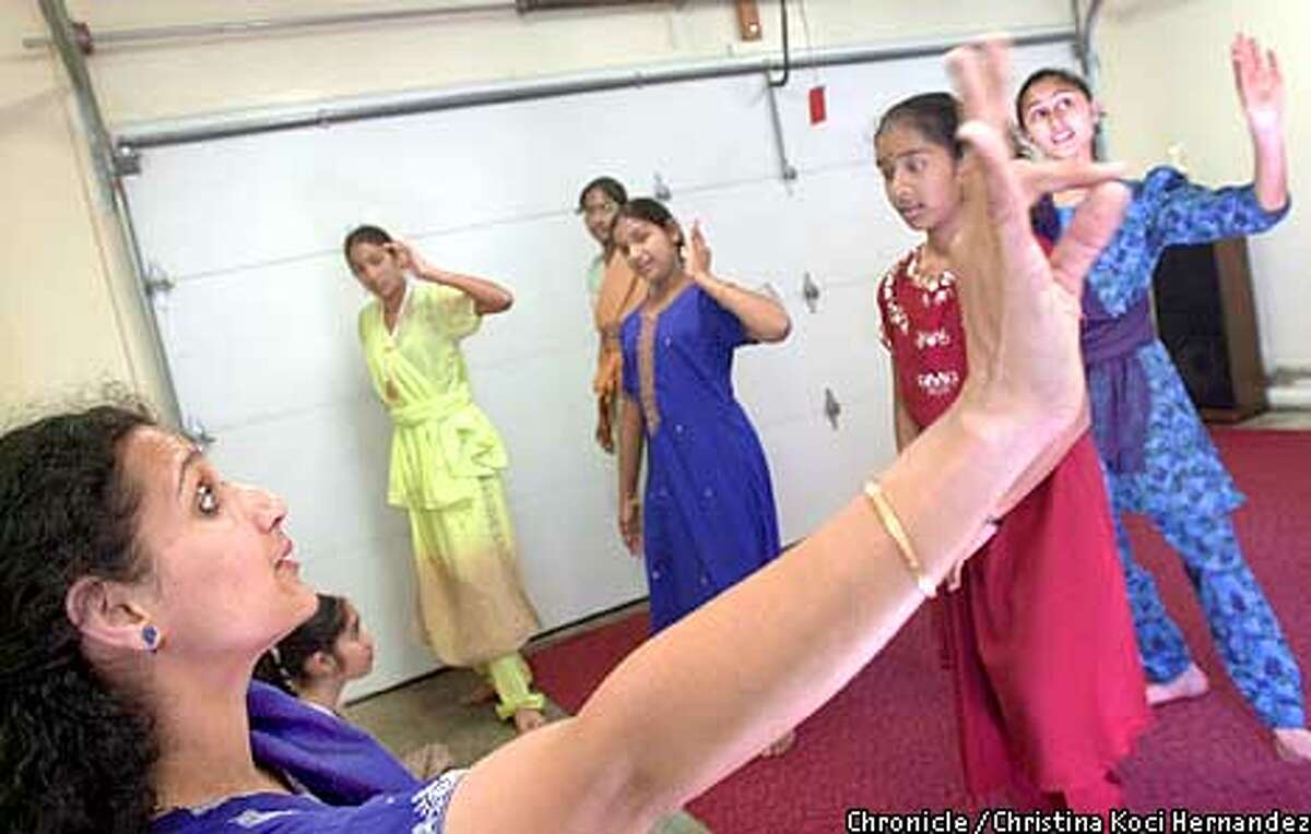 CHRISTINA KOCI HERNANDEZ/CHRONICLE Indumathy Ganesh teaches young Indian-American girls classical Indian dance in her garage/studio, in her Mission San Jose home. Race and ethnicity issues in Mission San Jose, Fremont.