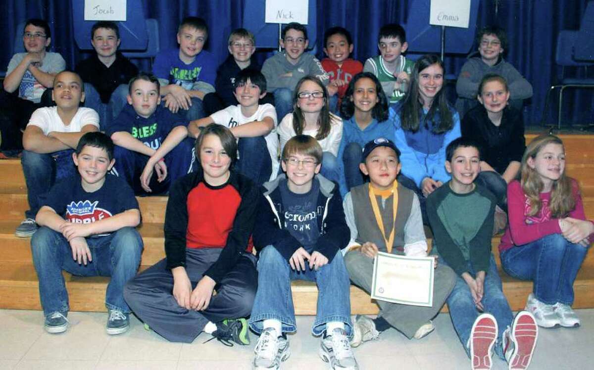 SPECTRUM/Finalists show emotions of all sorts as they pose for a photo on the day of Sarah Noble Intermediate School's edition of the National Geograhic geography bee in New Milford. January 2012. The winner was Grant Li, third from the right in the front row. Courtesy of Sarah Noble School