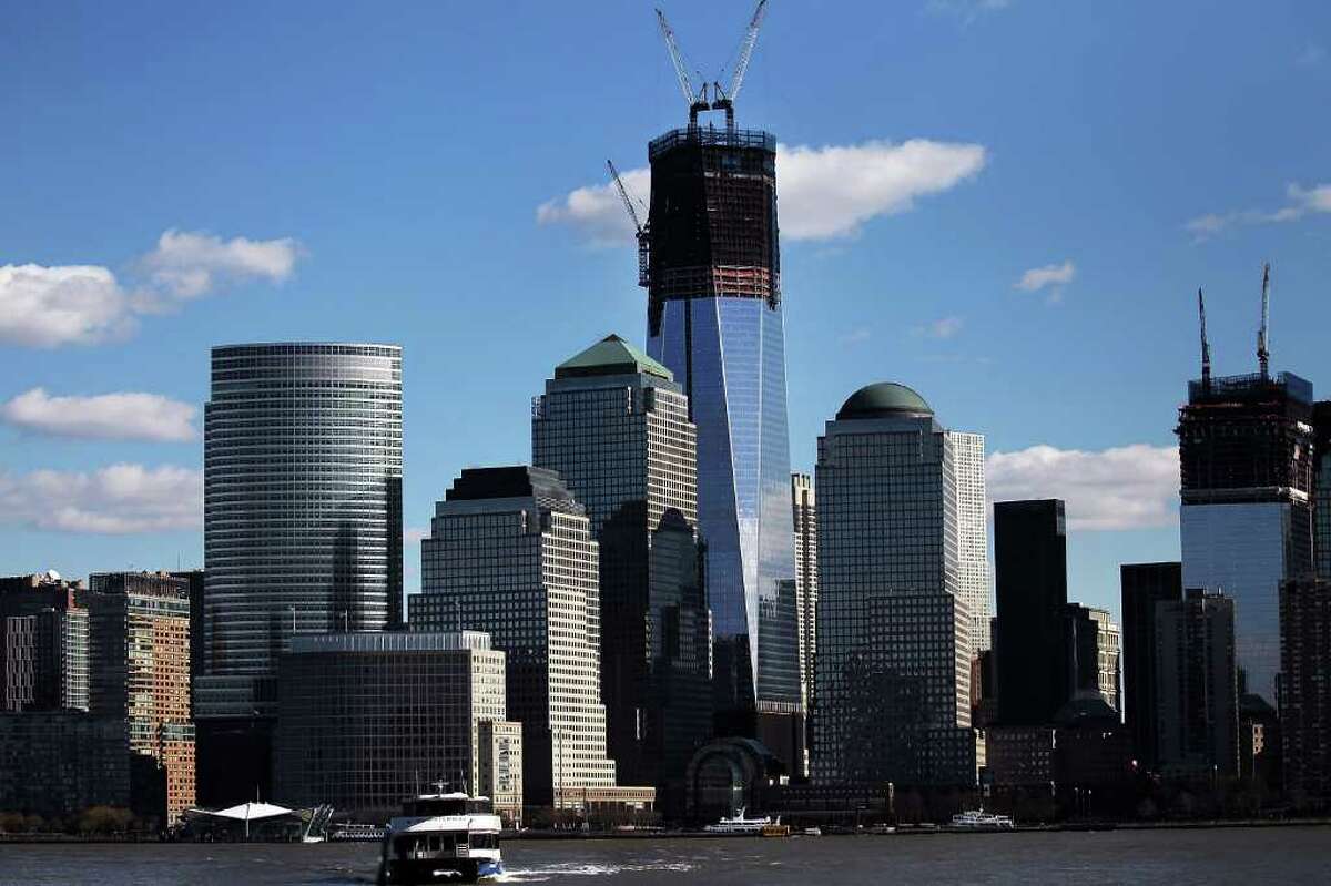 One World Trade Center, the central skyscraper at Ground Zero, stands under construction on January 30, 2012 in New York City. The price tag for One World Trade has recently been valued at $3.8 billion, which would make it the world's most expensive new office tower. Most of the cost overruns are due to the security measures being taken in the design of the building which sits on a site that has been bombed twice by terrorists. To offset the costs of One World Trade Center, which is being built by the Port Authority of New York and New Jersey, higher bridge and tunnel tolls have been instated and there has been a reduction in spending on transportation infrastructure. The 1,776-foot skyscraper is expected to be completed at the end of 2013.