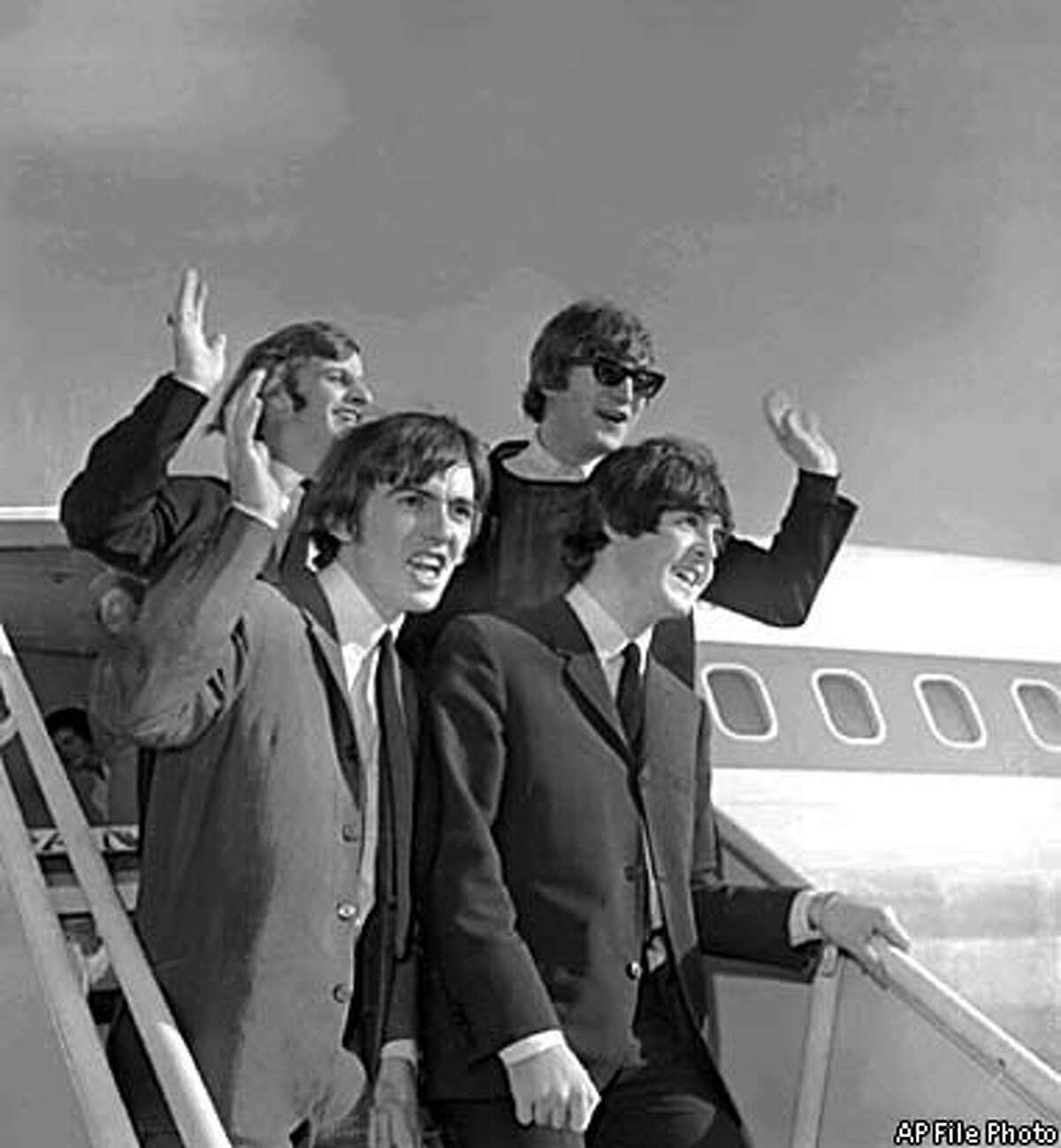 The Beatles arrived at San Francisco International Airport in August 1964 to begin an American tour at the Cow Palace. From left are Ringo Starr, George Harrison, John Lennon and Paul McCartney. Associated Press File Photo