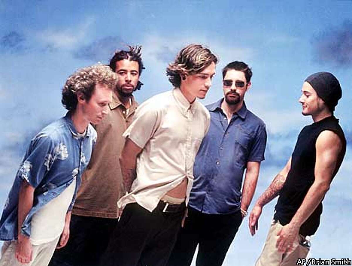 ADVANCE FOR WEEKEND EDITIONS, NOV. 1-4--Members of the rock band Incubus Mike Einziger, left, Chris Kilmore, Brandon Boyd, Dirk Lance and Jose Pasillas II are shown in this July, 2001, publicity photo. Incubus's latest album "Morning View" was released by Epic Records. (AP Photo/Brian Smith)