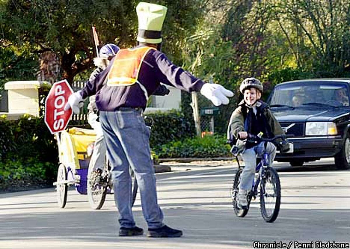 Carl Jones at Laurel School in Atherton. Helps kids and parents cross the street safely. PHOTOGRAPHY BY PENNI GLADSTONE