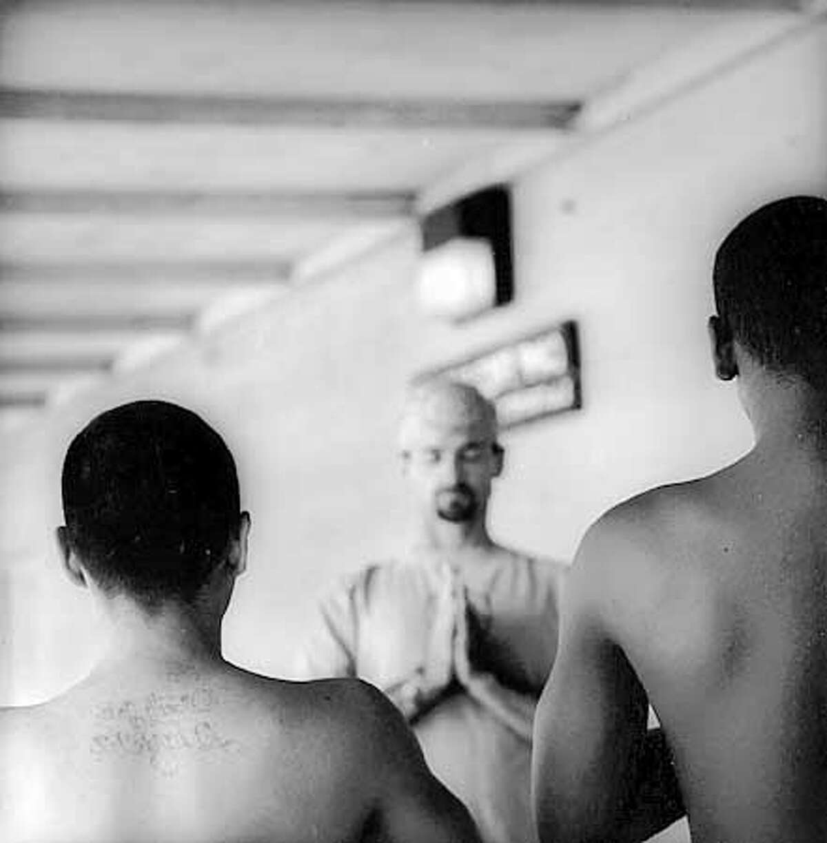 THIS IS A HANDOUT IMAGE. PLEASE VERIFY RIGHTS. A Yoga Inside instructor leads young people at a juvenille detention facility in relaxation techniques. Courtesy of James Wvinner