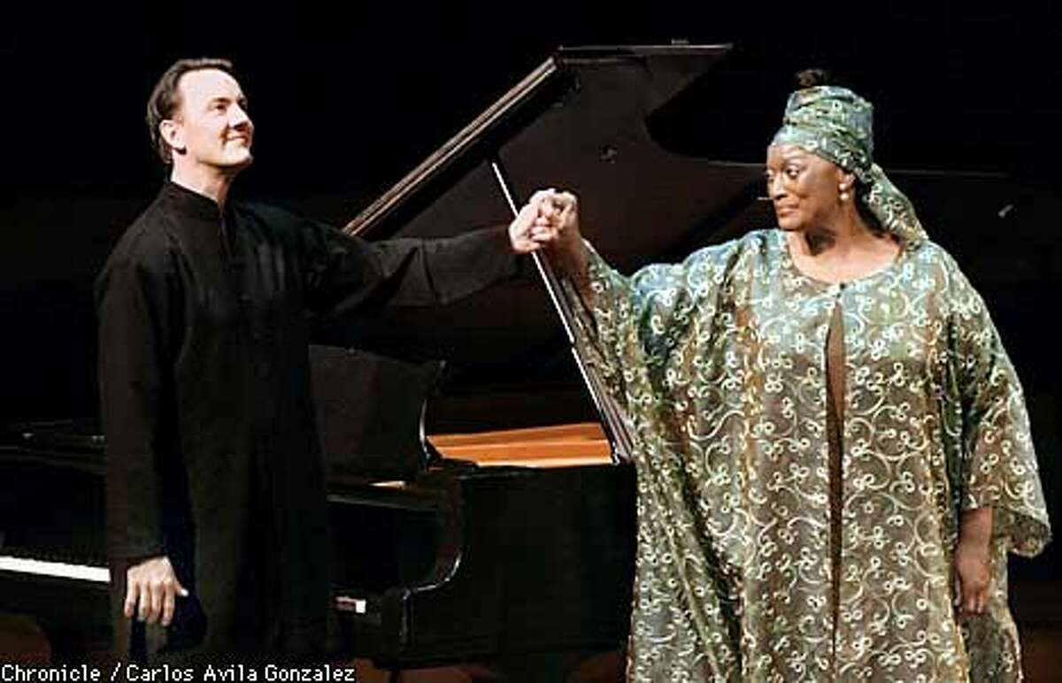Soprano, Jessye Norman, right, takes bows with pianist Mark Markham, during a performance at Davies Symphony Hall in San Francisco, Ca., on Sunday, March 24, 2002. (CARLOS AVILA GONZALEZ/SAN FRANCISCO CHRONICLE)
