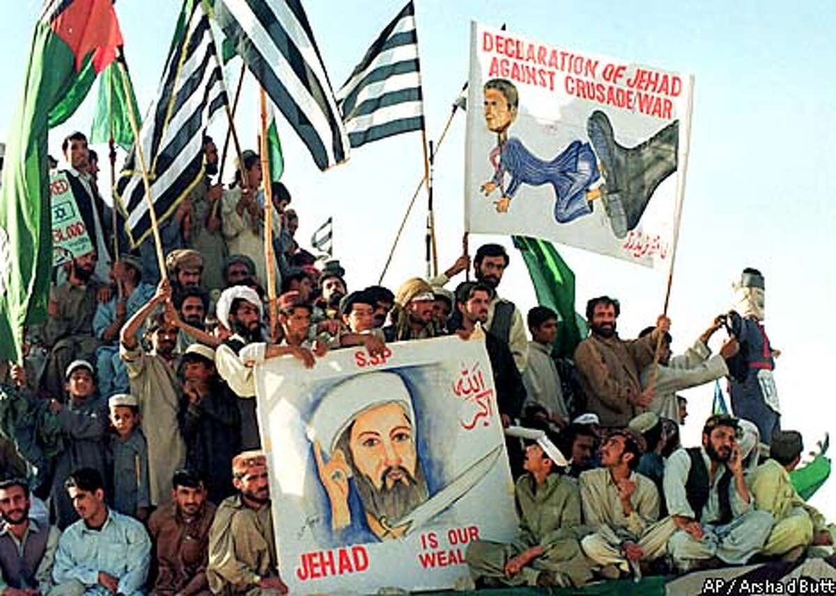 Supporters of Saudi dissident Osama bin Laden attend an anti-U.S. rally on Monday, Oct 15, 2001 in Quetta, Pakistan. (AP Photo/Arshad Butt)