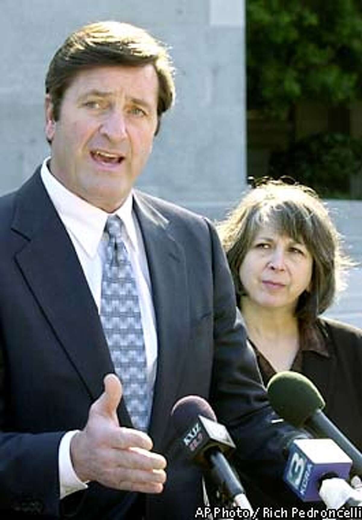John Garamendi, one of three Democratic candidates for insurance commissioner, speaks during a news conference at the Capitol in Sacramento, Calif., Thursday, Feb. 28, 2002, with whistleblower Cindy Ossias, right. Garamendi criticized fellow Democratic nominee, Assemblyman Tom Calderon, for taking campaign contributions from the insurance industry. (AP Photo/Rich Pedroncelli)
