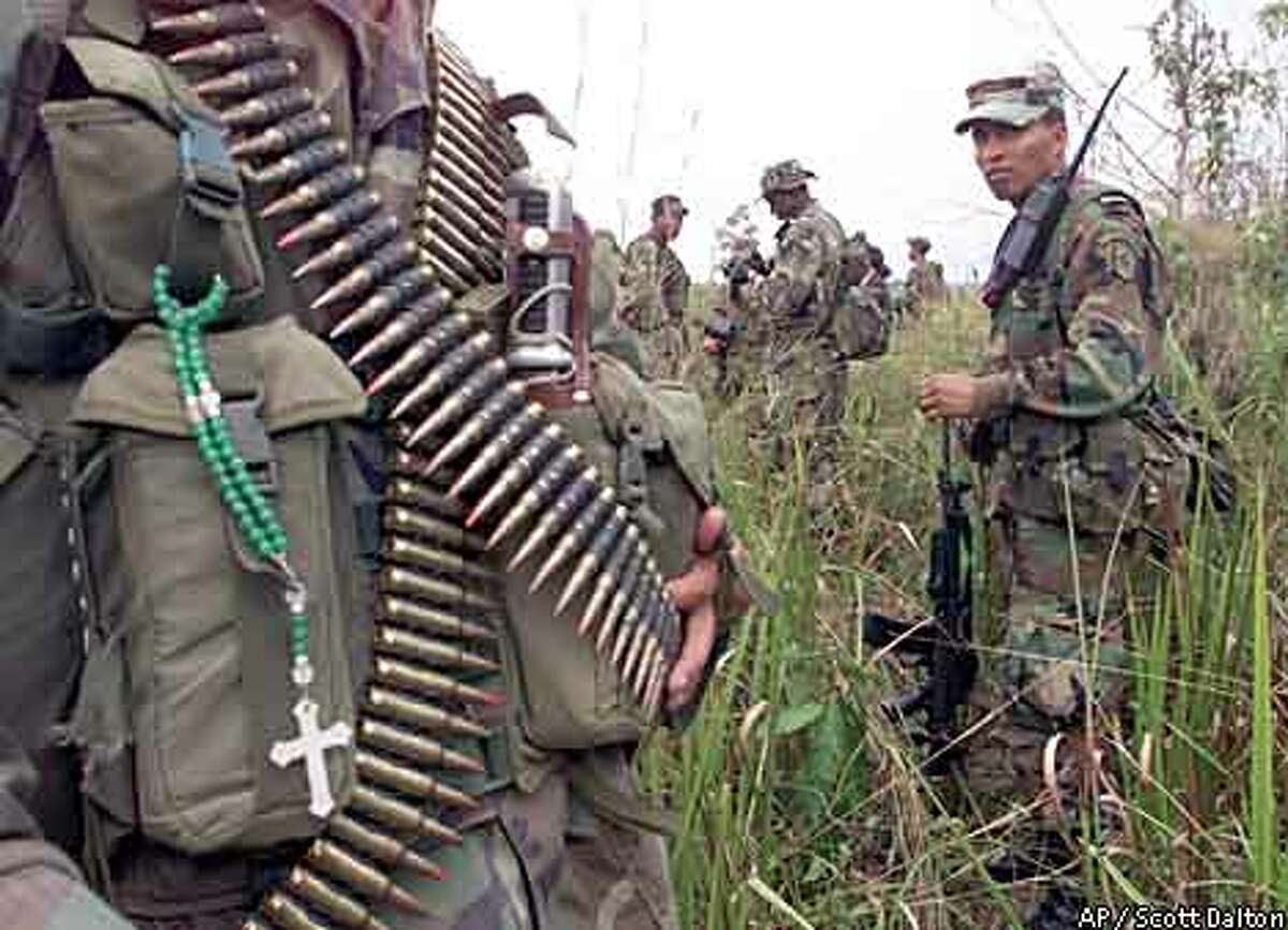 Colombia invades rebel zone / Ground troops attack after bombing runs