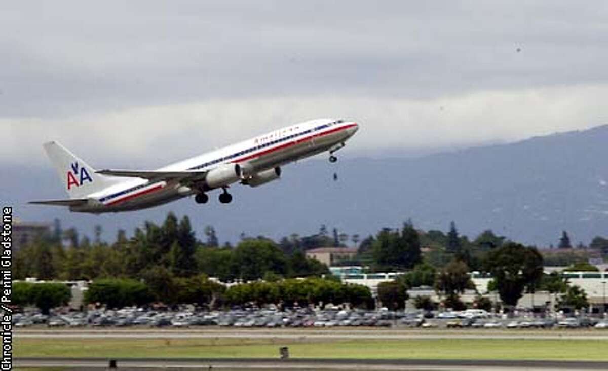 An American Airlines plane takes off at San Jose Int'l Airport. CHRONICLE PHOTO BY PENNI GLADSTONE