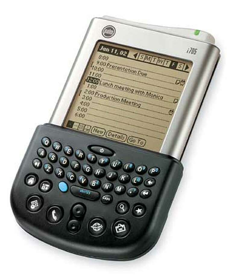 Palm rides wireless wave / Latest handheld device courts the corporate