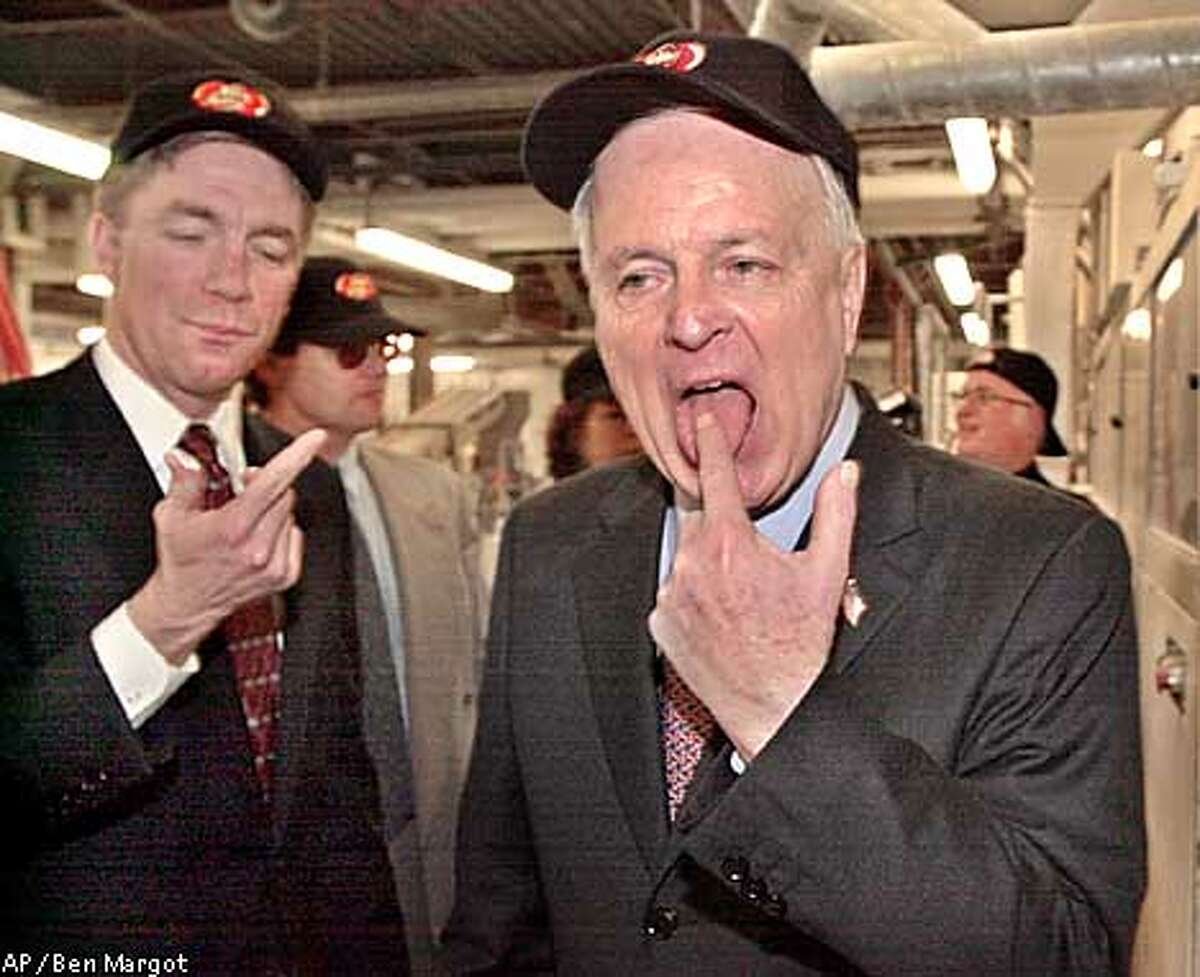 Republican gubernatorial candidate Richard Riordan, right, and Rep. Doug Ose, R-Sacramento, sample sugar that is used to manufacture "Jelly Belly" jellybeans Monday, Jan. 28, 2002, at the Jelly Belly Candy Company in Fairfield, Calif. (AP Photo/Ben Margot)
