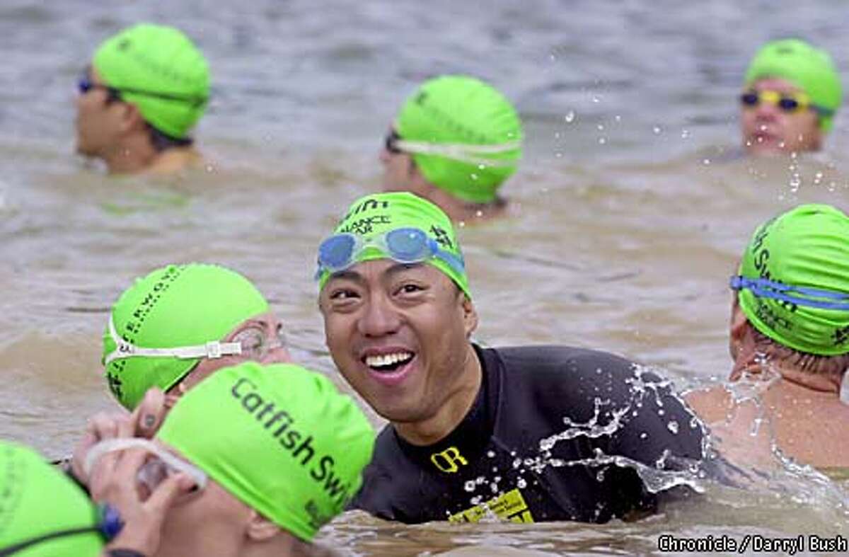 Louie Bonpua flashed a smile as he got ready to swim in the Catfish 2.4-Mile Swim at Lexington Reservoir in Los Gatos last summer. Chronicle photo by Darryl Bush