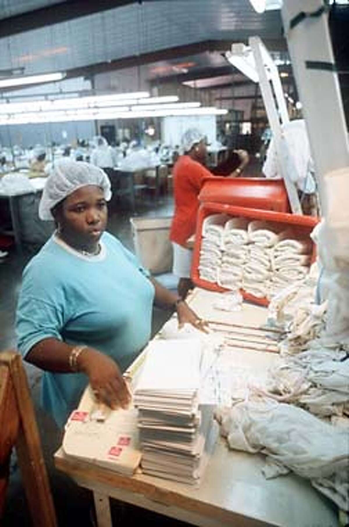 Garment worker in the film Life and Debt.
