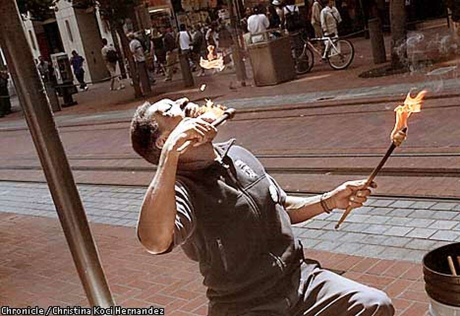 Pulse of Powell Street / Performer Larry Hunt lays down his summer