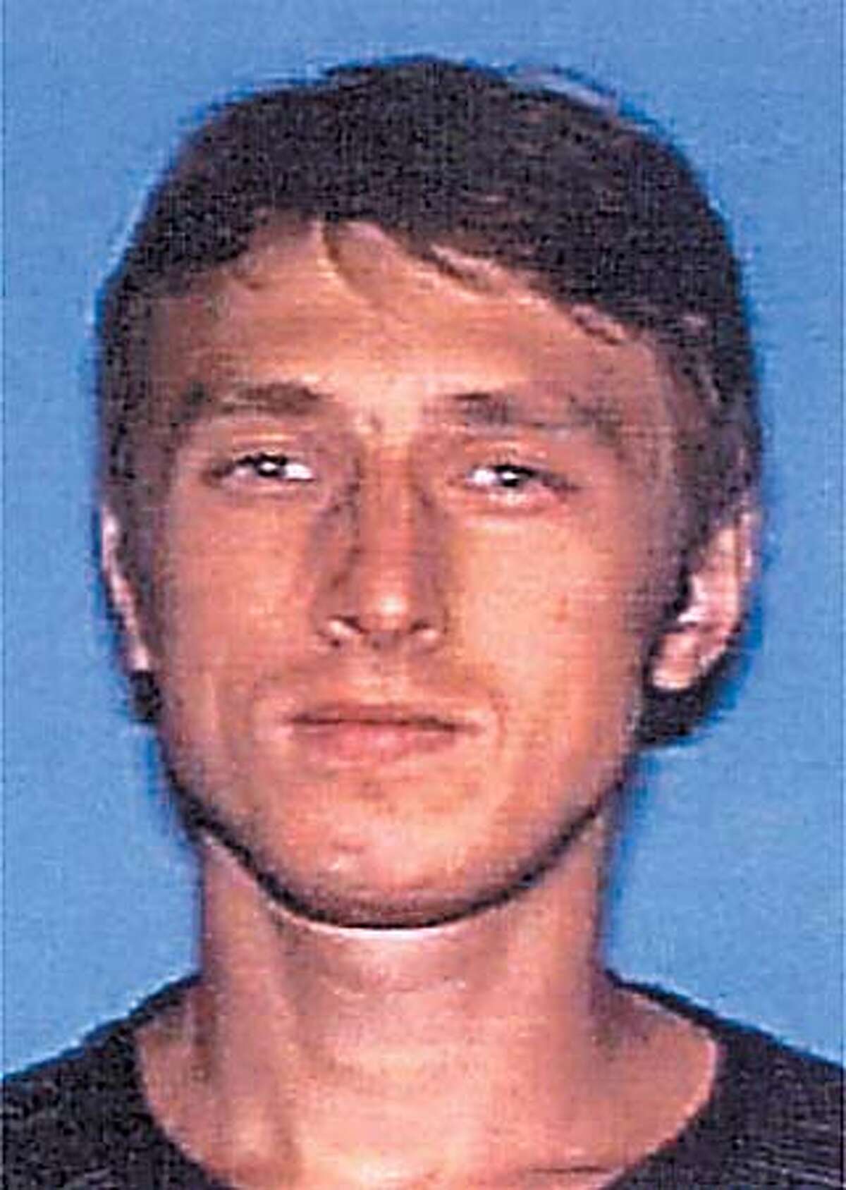 Sacramento County Sheriffs released August 21, 2001 this 'wanted' posted of murder suspect Nikolay Soltys, written with Russian cyrillic script. Police offered a $10,000 reward on Tuesday for information leading to the arrest of an unemployed Ukrainian immigrant suspected of stabbing his pregnant wife to death and murdering four other family members before disappearing with his 3 year old son. QUALITY FROM SOURCE REUTERS/HO