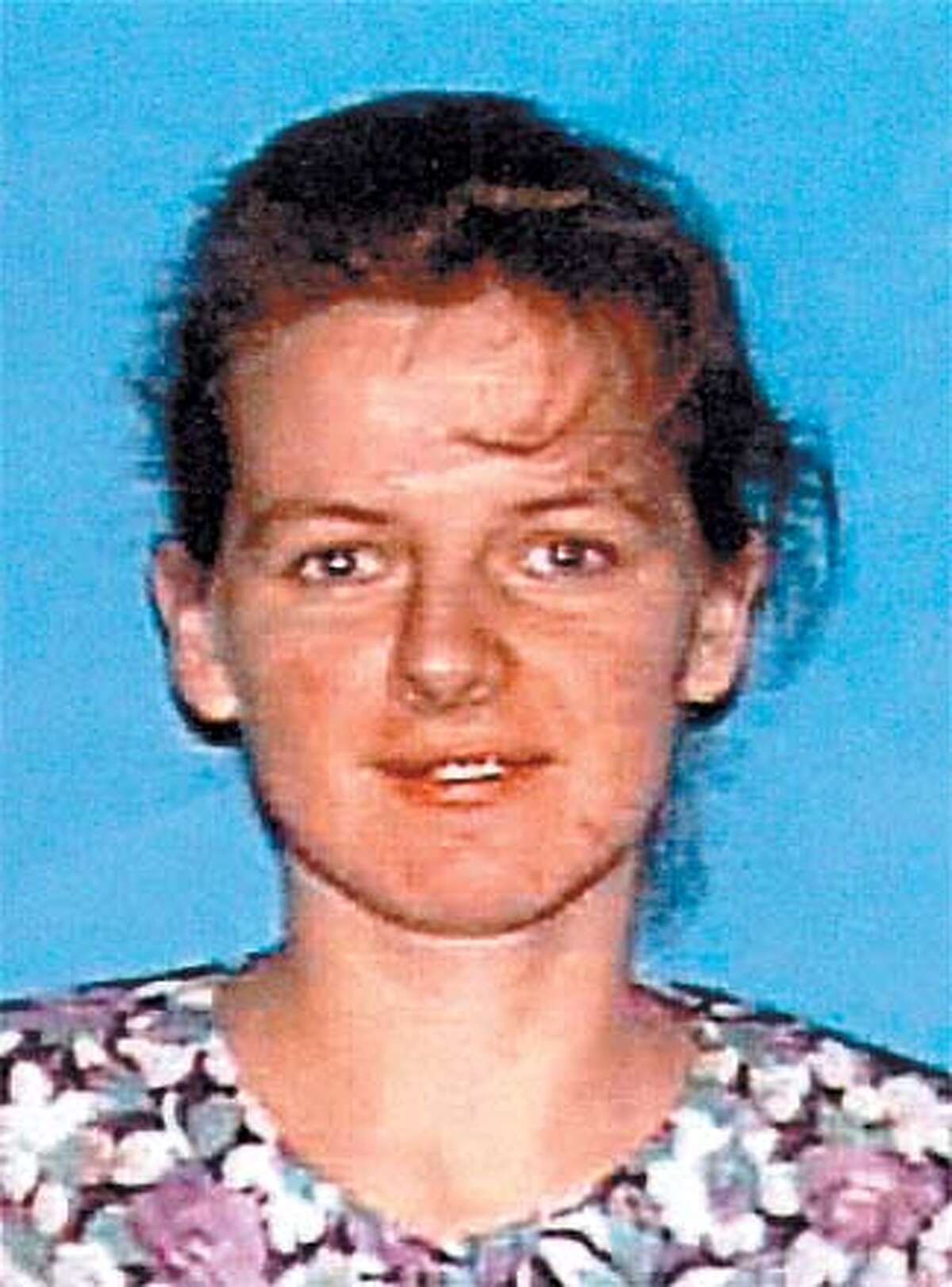 FILE--Lyubov Soltys, the slain wife of Nikolay Soltys, is shown in this undated drivers license photo provided by the California Department of Motor Vehicles. Authorities posted a $10,000 reward Tuesday and pursued dozens of tips in a nationwide manhunt for Nikolay Soltys, the Ukrainian immigrant who allegedly killed his pregnant wife Lyubov, and four other relatives before fleeing with his toddler son. (AP Photo/California Department of Motor Vehicles, File)