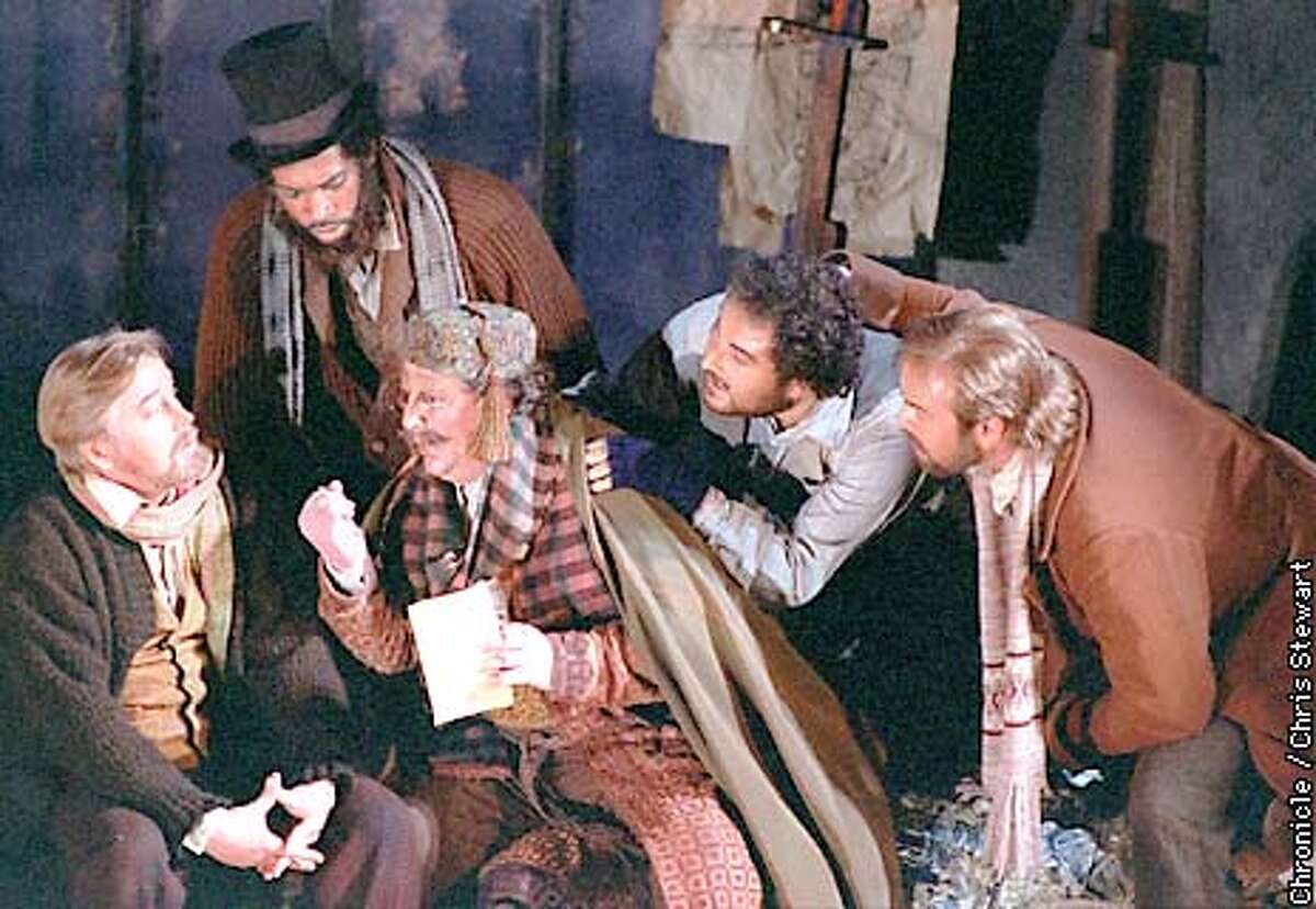 Four Boh�mian artists attempt to bamboozle their landlord Benoit, portrayed by Peter Strummer (C). (L-R) Victor Ledbetter as Marcello; Chester Patton as Colline; Strummer as Benoit; Roberto Aronica as Rodolfo and David Okerlund as Schaunard in Act I of Giacomo Puccini's "La Boh�me," being produced by the SF Opera. SAN FRANCISCO CHRONICLE PHOTO BY CHRIS STEWART