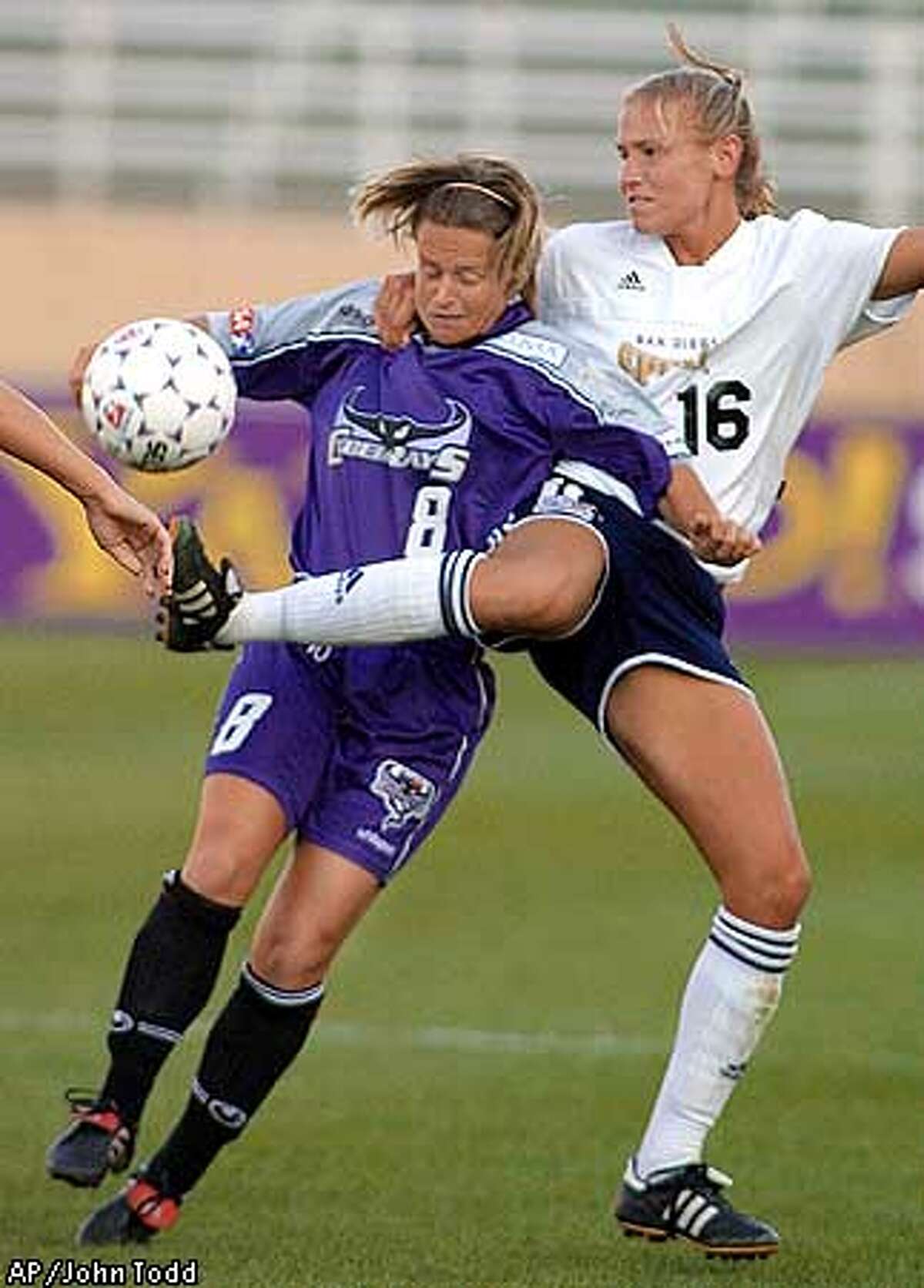 San Diego Spirit's Kim Pickup, right, and Bay Area CyberRays' Julie Murray, left, battle for the ball in the first half at Spartan Stadium in San Jose, Calif., Wednesday, July 25, 2001. (AP Photo/John Todd)