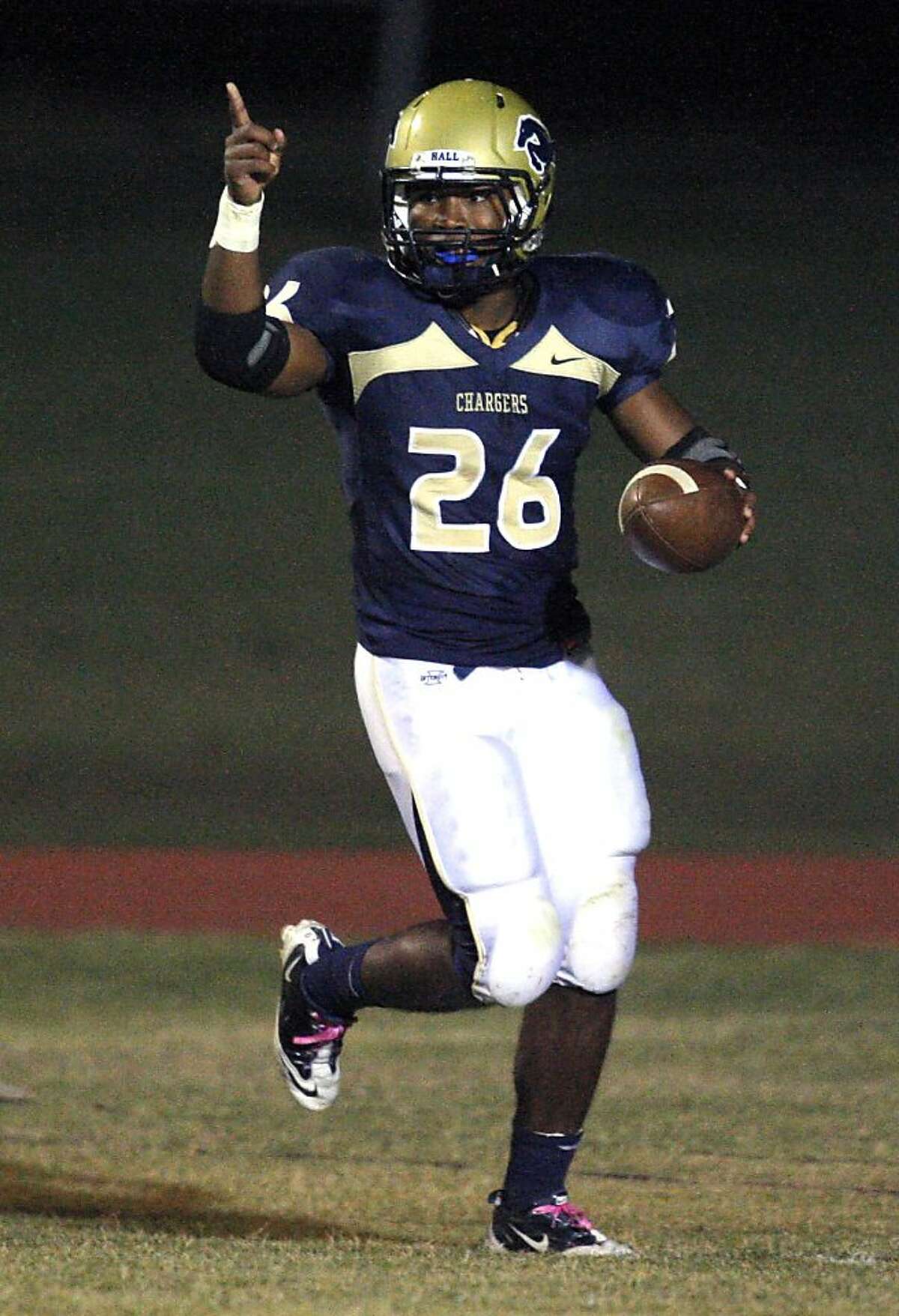 Heritage Hall's Barry J. Sanders celebrates a touchdown during the high school football game between Heritage Hall and Bethany at Heritage Hall in Oklahoma City, Friday, Oct. 28, 2011. Photo by Sarah Phipps, The Oklahoman