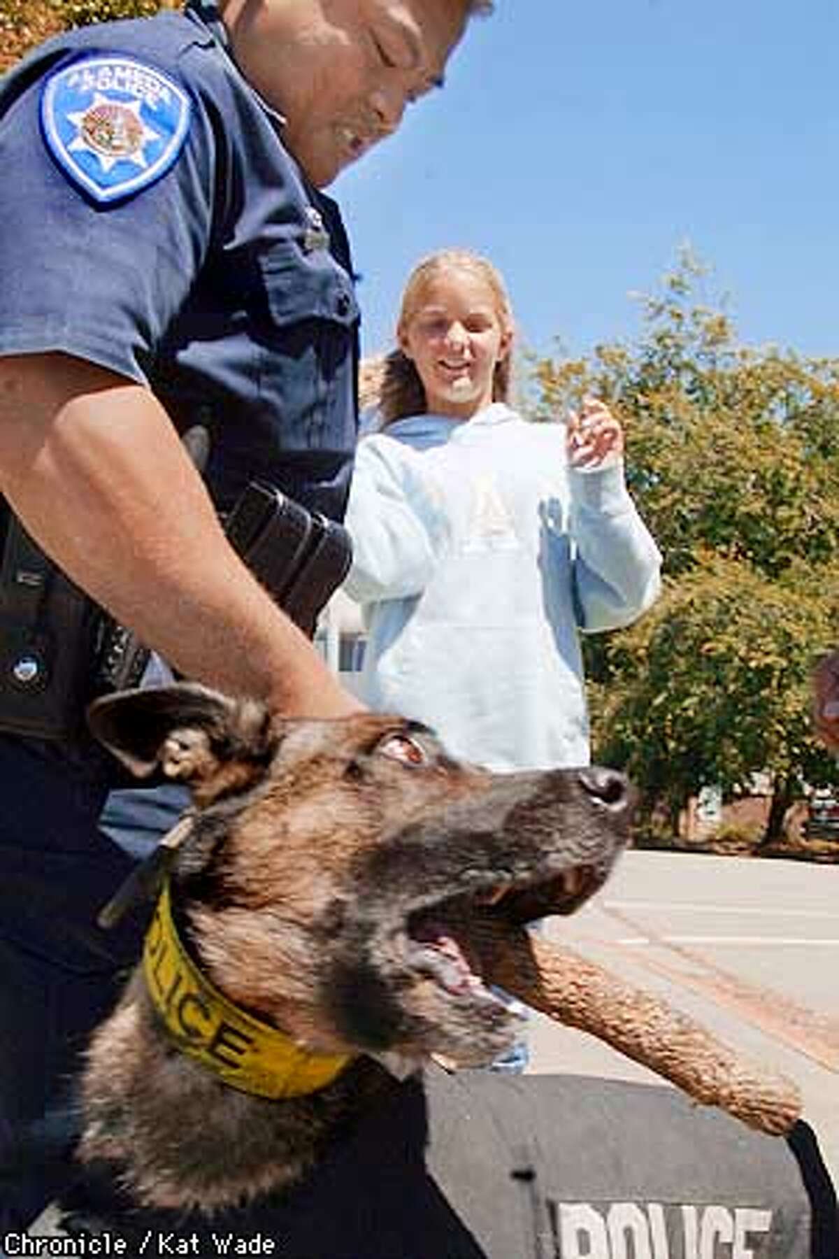 Alameda girl helps protect dogs who serve / 12yearold raises cash to