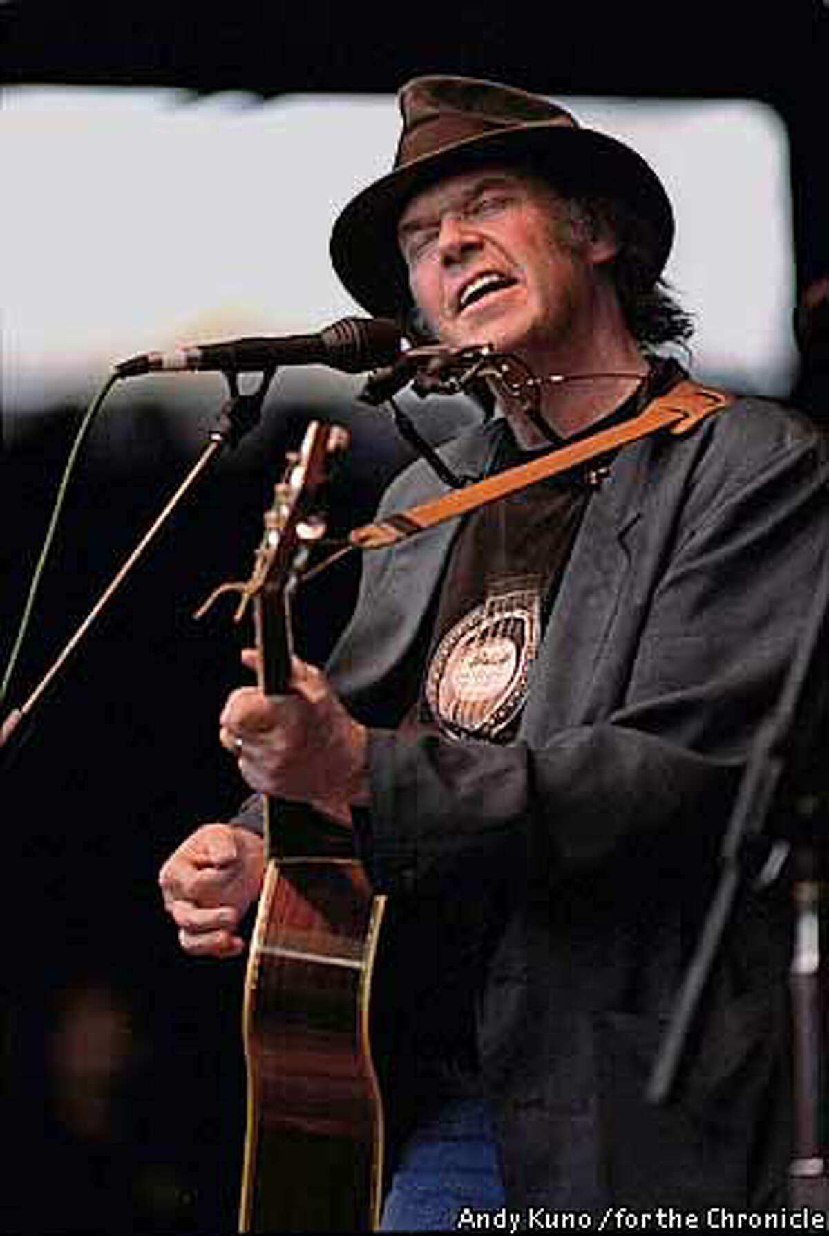 Benefit organizer Neil Young sang several songs splendidly. Photo by Andy Kuno for the Chronicle