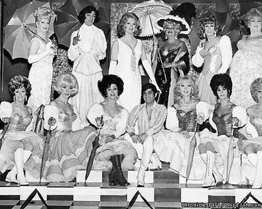 Turned out in dresses, wigs and parasols, the cast of Finocchio's as it appeared in its heyday at the club on Broadway. Chronicle Photo 1971 by Lloyd Johnson