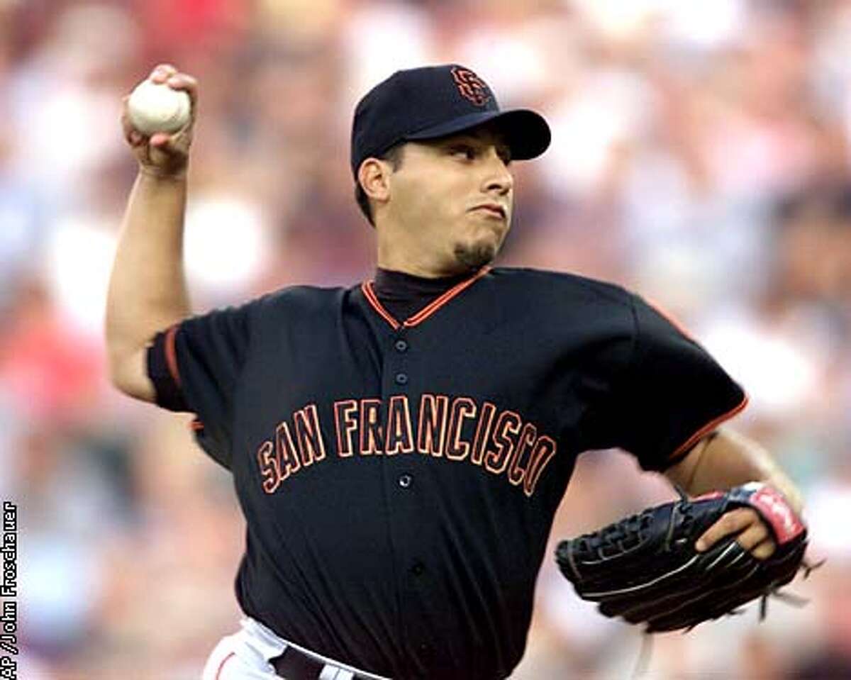 A's, Giants bust out / Vintage Ortiz holds down Mariners' offense