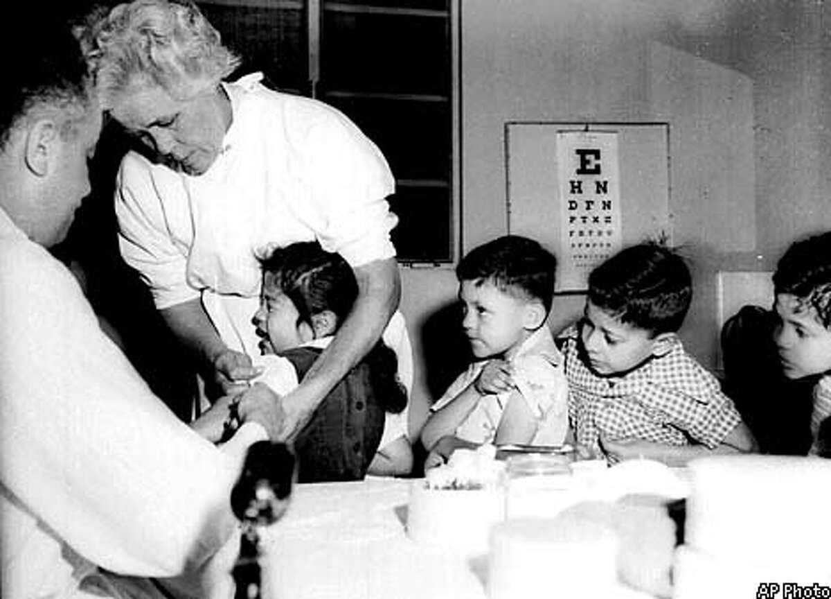 Students at St. Vibiana's school in Los Angeles were among the first to receive the Salk vaccine. Associated Press File Photo