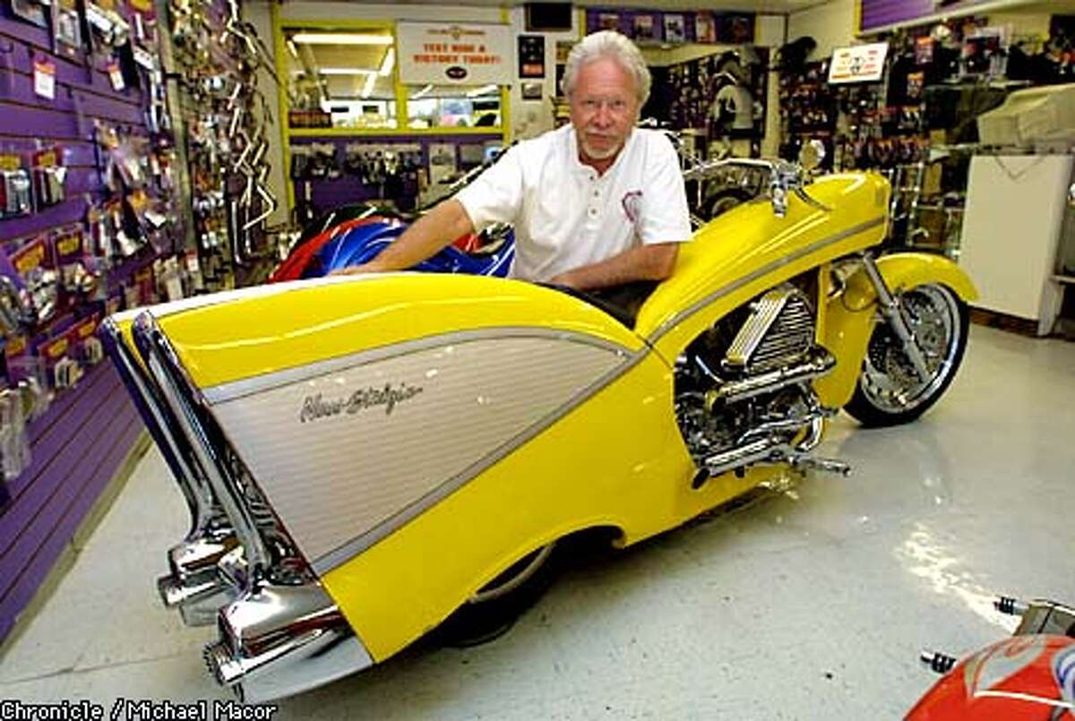 Arlen Ness posed in his San Leandro shop with his creation, the Ness-Stalgia, which was inspired by the classic 1957 Chevrolet. Chronicle photo by Michael Macor