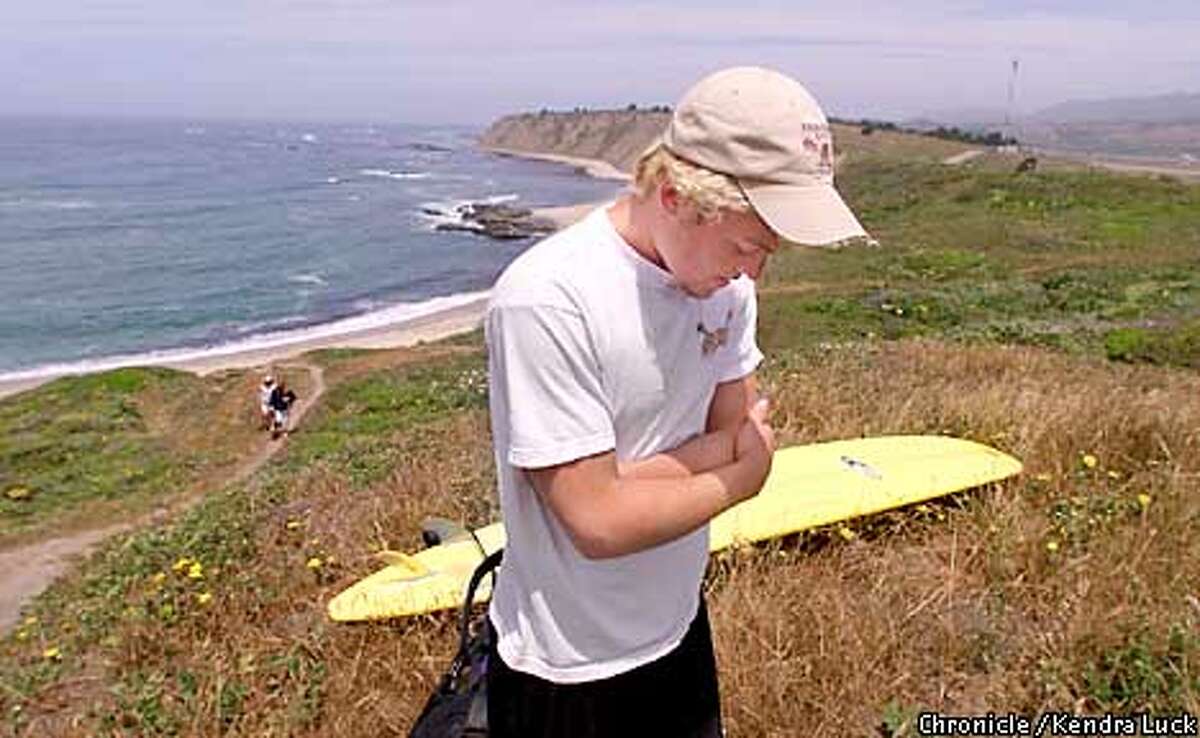 Over looking Ross' Cove near Mavericks Doug Jordan, 17, of King Mountain didn't know Moriarty personally, but know of him and looked at him a role model when surfing. (KENDRA LUCK/SAN FRANCISCO CHRONICLE)