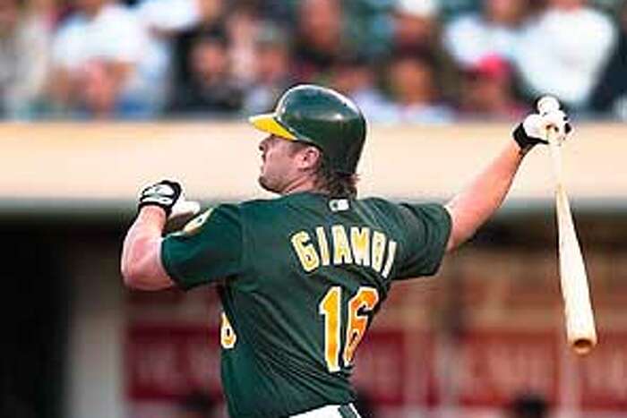 Do-over: The A's sign Jason Giambi to an extension in 2001 - The