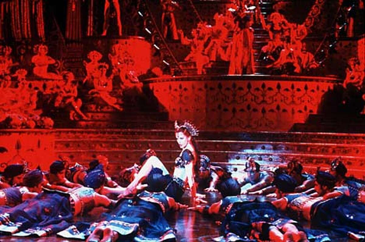 Elaborate costumes and dance numbers are part of the over-the-top fun of Baz Luhrmann's "Moulin Rouge,'' starring Nicole Kidman.