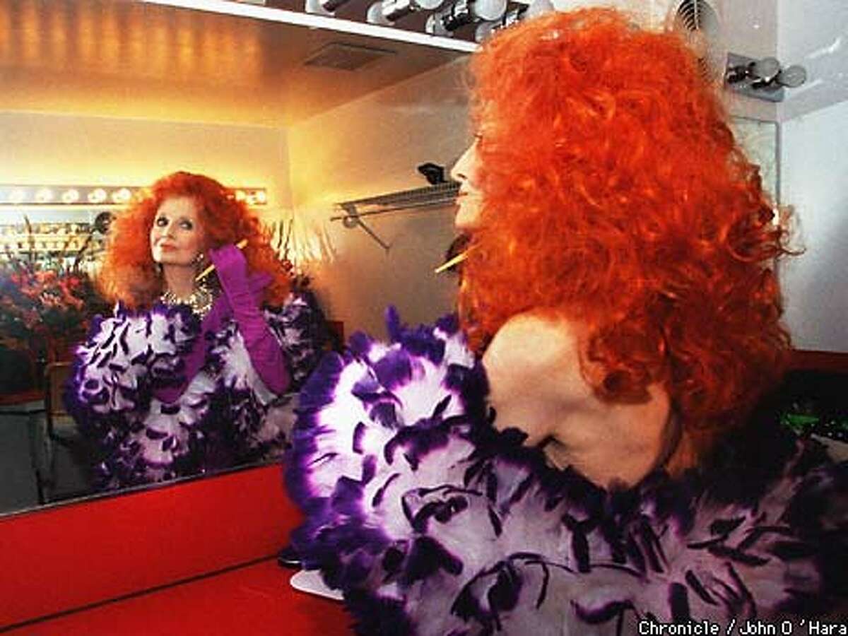 Tempest Storm, who says her age is "unlisted," was a featured performer at the O'Farrell Theatre's 30th anniversary celebration. In 1957, she was paid $100,000 to tour what was left of San Francisco's once-flourishing burlesque circuit. Chronicle Photo by John O'Hara