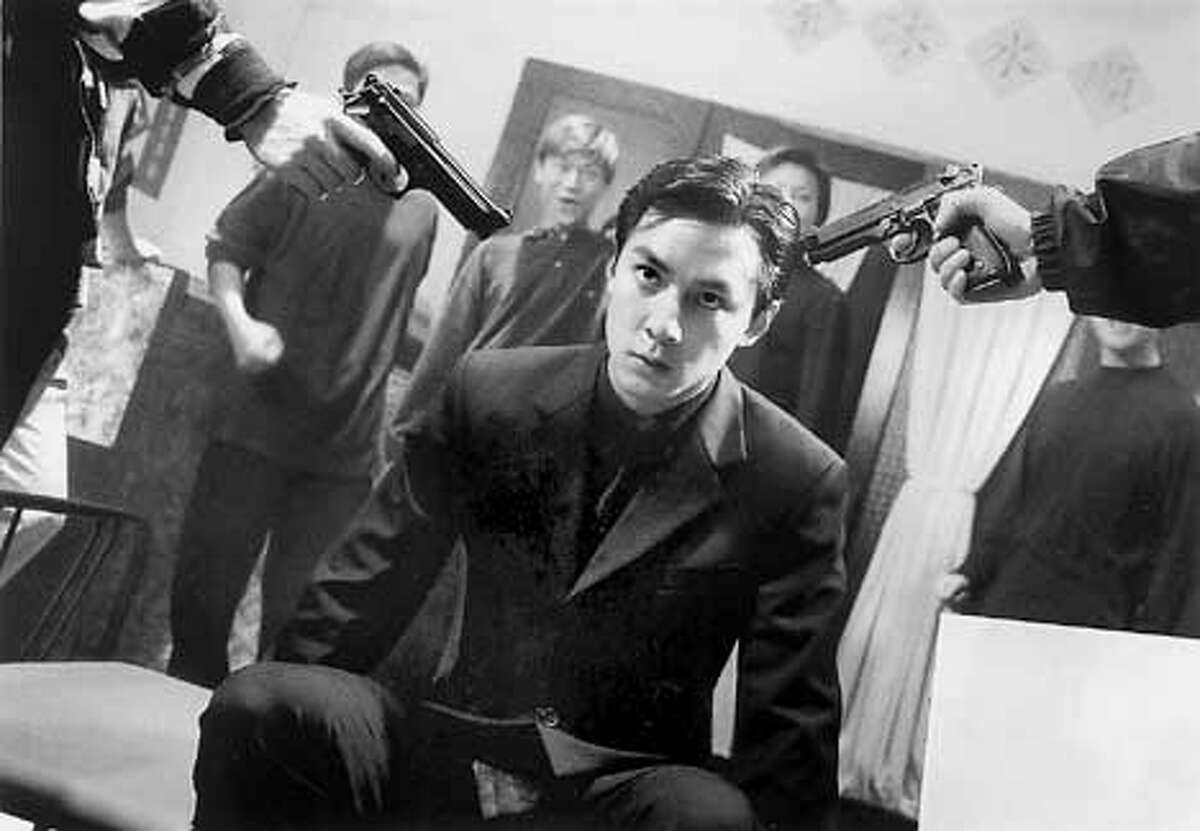 Hong Kong 'Cop' Goes Bad / Slick gangster film plays on fantasies