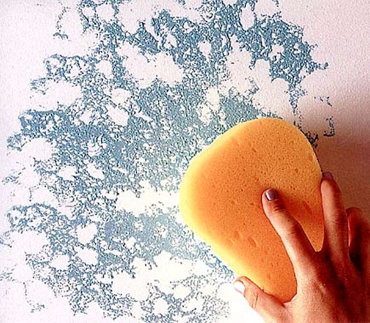 Paint misty for me / Color it easy Sponging paint onto a wall is an