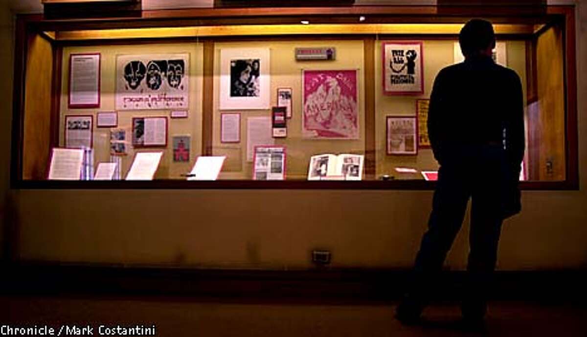 Tim Karas paused for a moment to review the memorabilia of an era at UC Berkeley. Chronicle photo by Mark Costantini