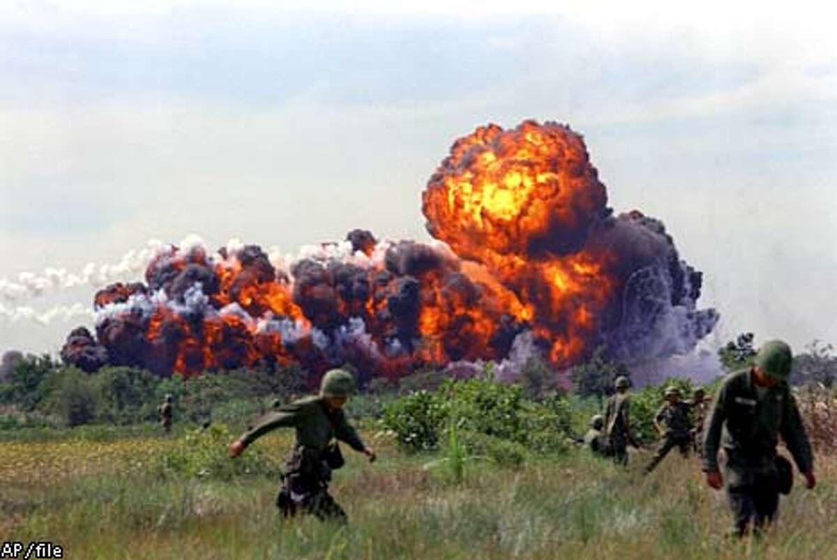 The jungle erupted into a giant fireball after napalm was dropped near U.S. troops on patrol in South Vietnam in 1966. Associated Press File Photo