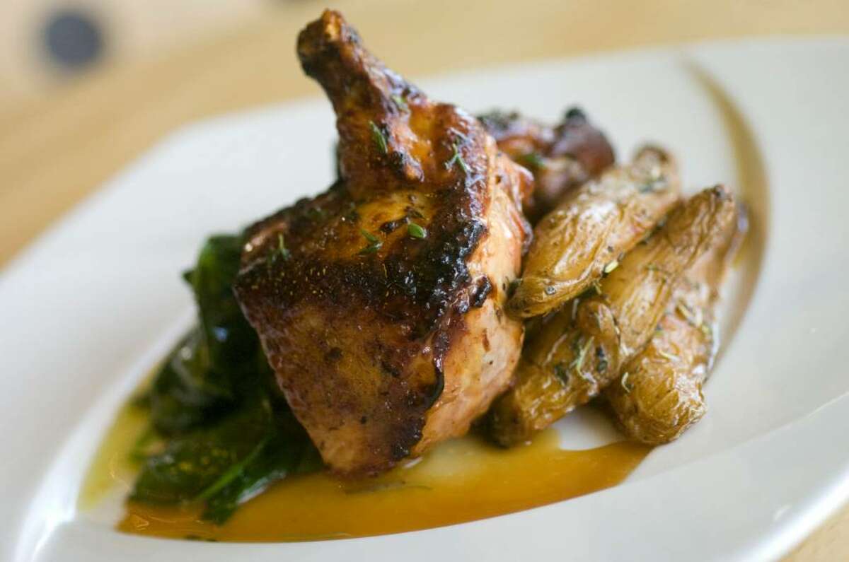 Pan roasted chicken with potatoes and greens at Nicholas Roberts Gourmet Bistro in Norwalk, Conn. Oct. 26, 2009.