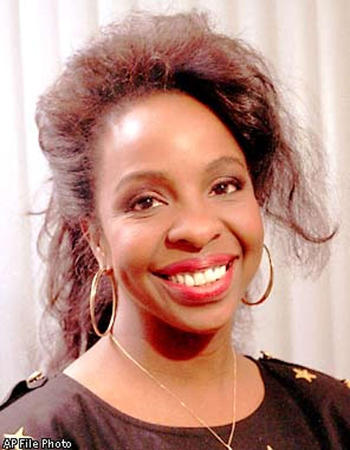 FILE--Singer Gladys Knight, seen in this 1990 file photo, will become the spokeswoman for Aunt Jemina pancakes and syrup, Quaker Oats announced Friday, Sept. 16, 1994. The Quaker Oats Co. hopes the singer will help dispel negative racial stereotypes attached to the popular brand. (AP Photo/File)