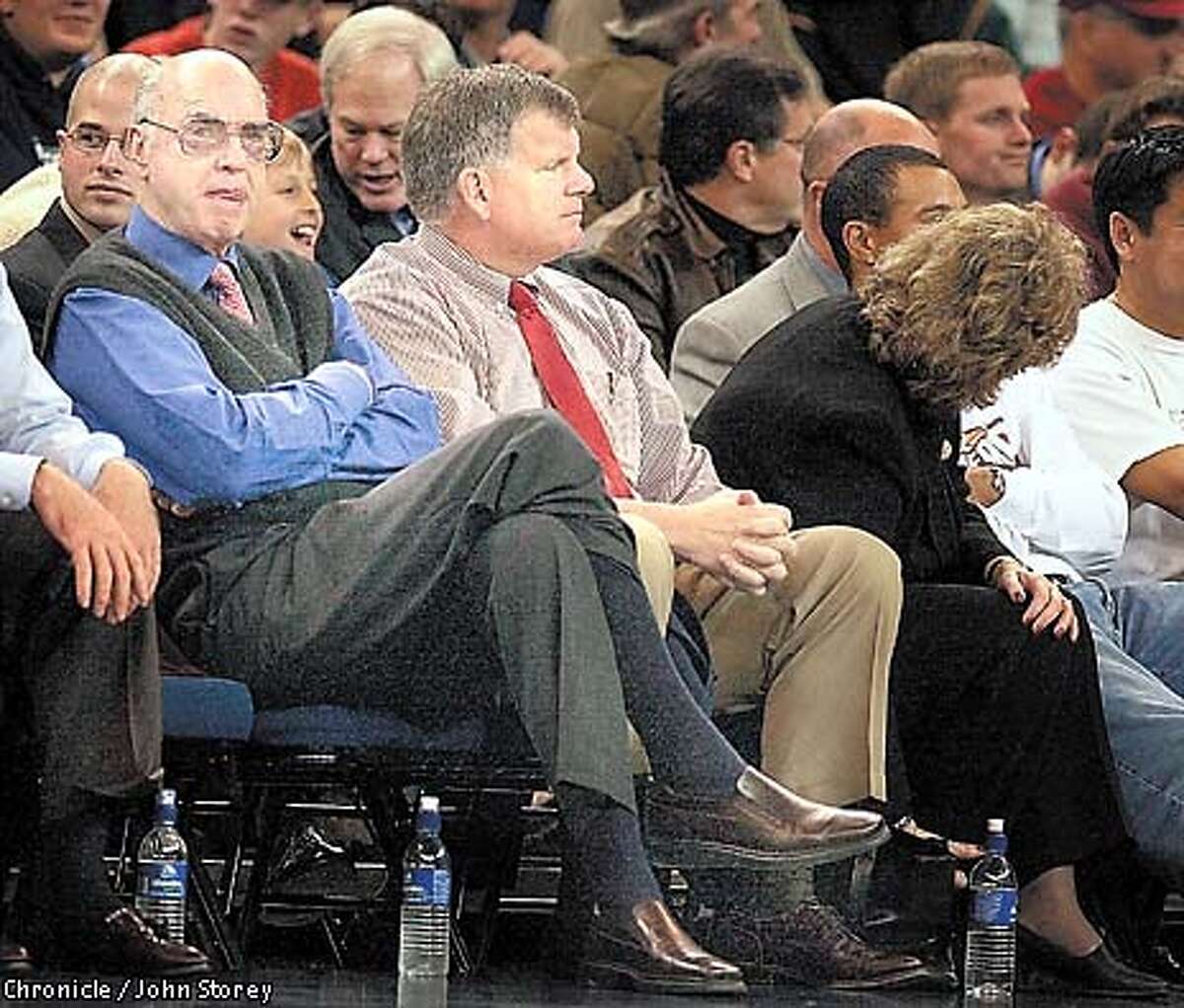 STANFORD-21DEC00-SP-JRS-John Arrillaga and Ted Leland at the Stanford vs. Duke basketball game at the Oakland Coliseum in the Pete Newell Challenge. Photo by John Storey.