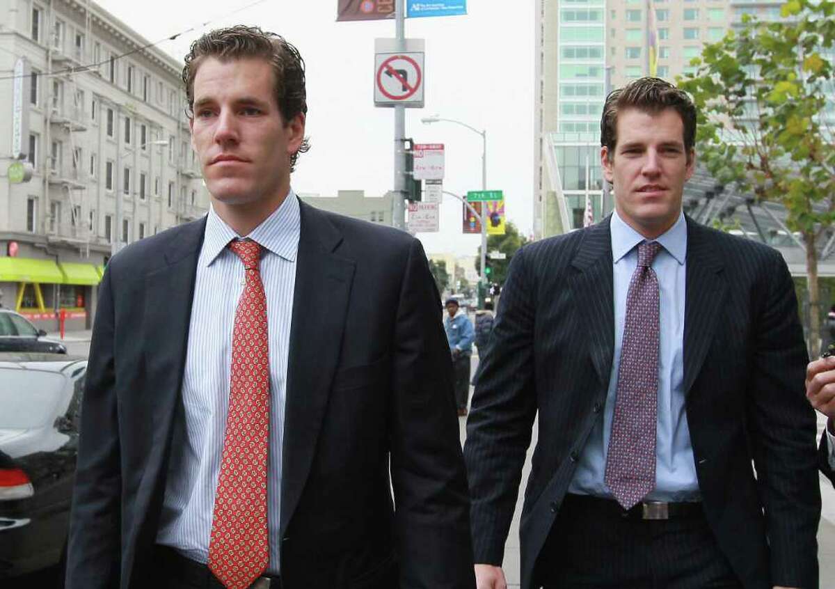 Greenwich natives Cameron, left, and Tyler Winklevoss leave the U.S. Court of Appeals on Jan. 11, 2011, in San Francisco.