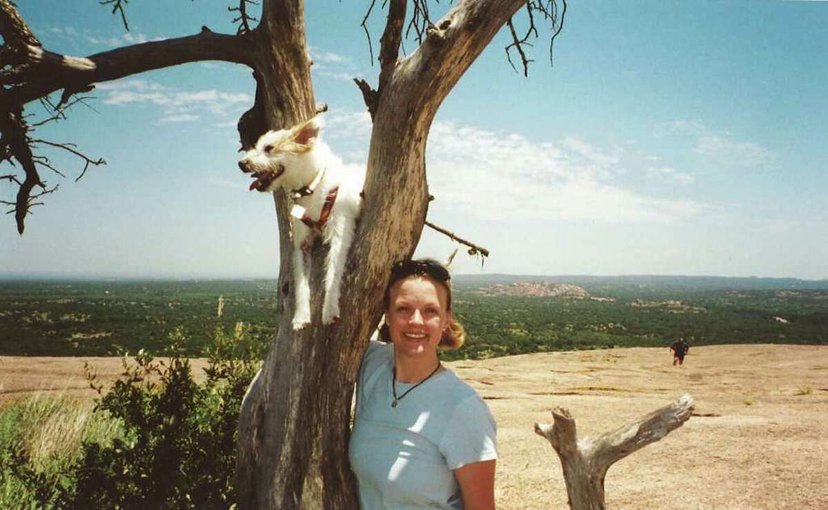 Dana Clair Edwards and her dog Grit in 2007. Prosecutors believe Edwards was killed early New Year’s Day 2009. Grit’s body was found a week later.