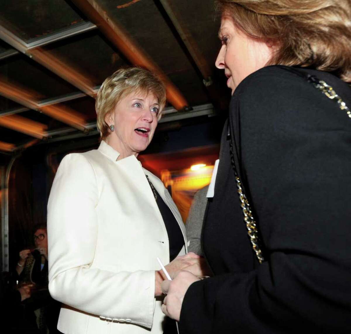 Republican U.S. Senate candidate Linda McMahon, left, meets Clare Powell of Stamford during an appearance at SBC Restaurant & Brewery in Stamford, Thursday night, Feb. 2, 2012.