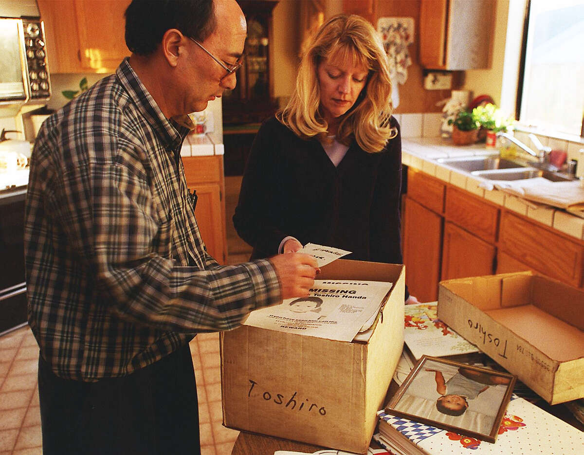 FILE, 1998 - Earl Handa and his wife Susan of Fairfield looked through a collection of photographs, newspaper clippings, missing children posters-- anything that had to do with the disappearance of Earl's nephew Clark Toshiro Handa-- who disappeared on August 22, 1984 when he was 3-year-old. Clark will be 18-years-old this month and looking over the memories makes the Handas feel like people still care and that there's hope Clark will one day return home.