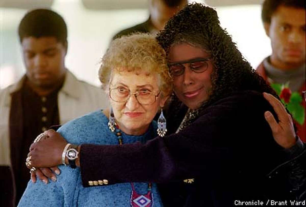 JOONESTOWN2/18NOV98/MN/BW--Survivors of Jim Jones and Jonestown, Neva Sly, left, and Yulanda Williams were reunited at the 20th anniversary memorial held in Oakland Wednesday. Yulanda escaped through the jungle. Neva got out but lost her husband. By Brant Ward/Chronicle