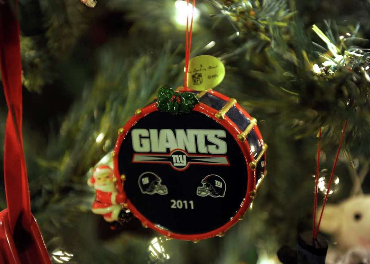 One of a bunch of Giants ornaments decorating fan Lynn Ramos' Christmas tree at her home in Bridgeport, Conn. on Wednesday February 1, 2012. She and her son Bobby decided to leave the tree up because it was "good luck" for the team. They won't take it down until after the superbowl.
