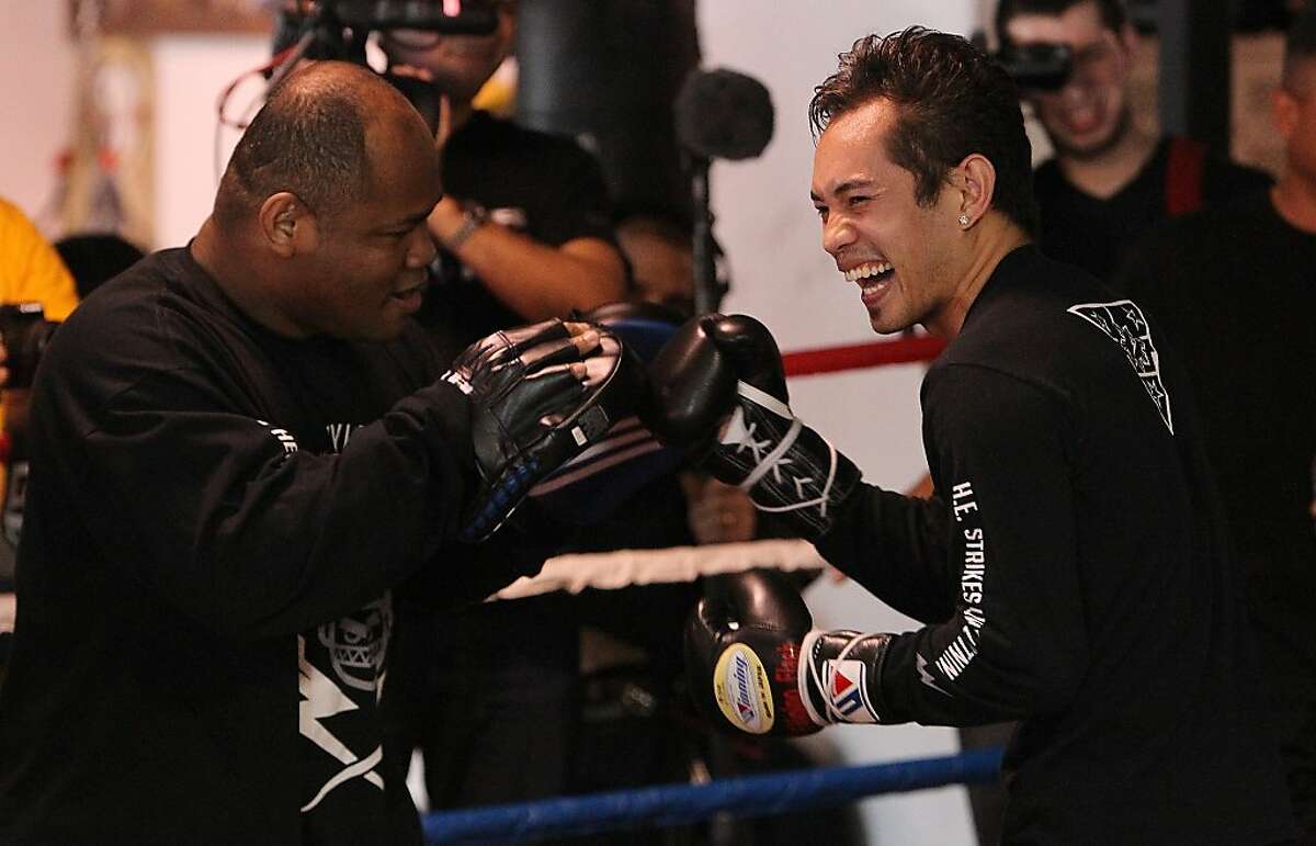 Nonito Donaire (right) works out at Championfit Gym with sparring partner Morris East on Wednesday in preparation for Saturday night s fight against Wilfredo Vazquez Jr. at the Alamodome.