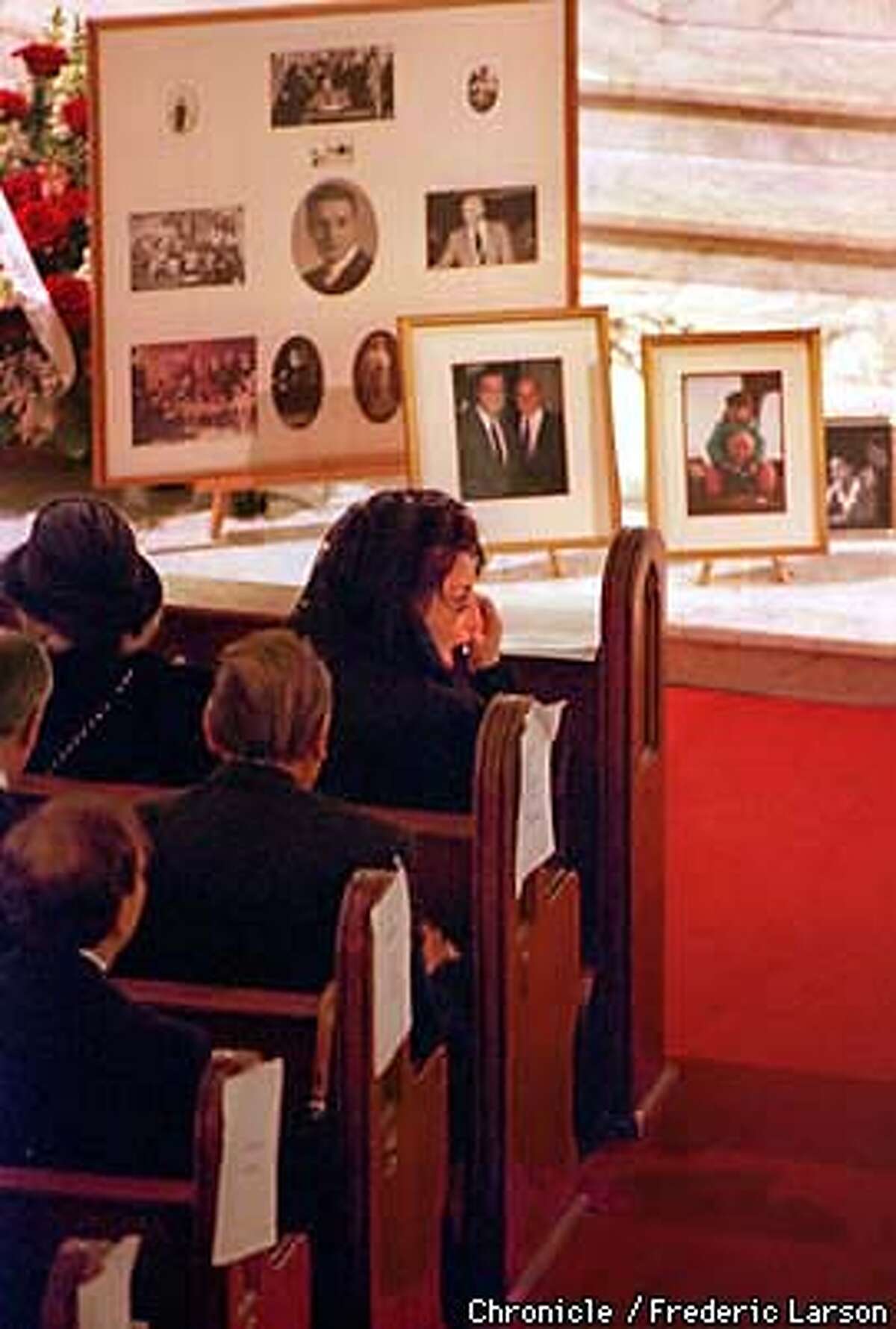 ALIOTO ANGELA/C/MN/FRL: Surrounded by family photograph during Joseph Alioto funeral, Joe daughter, Angela drys a tear from her face. Chronicle photo by Frederic Larson.