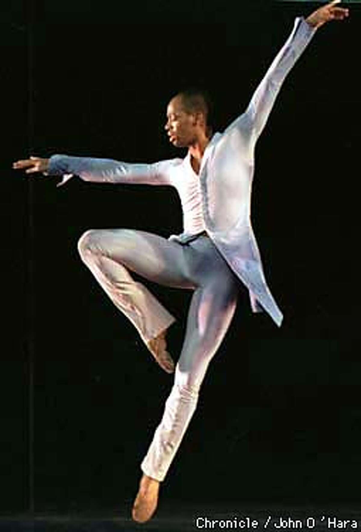 "Dance Theatre of Harlem". Adrian (Angel on Earth) Cedric Rouse in performance. Photo by............John O'Hara