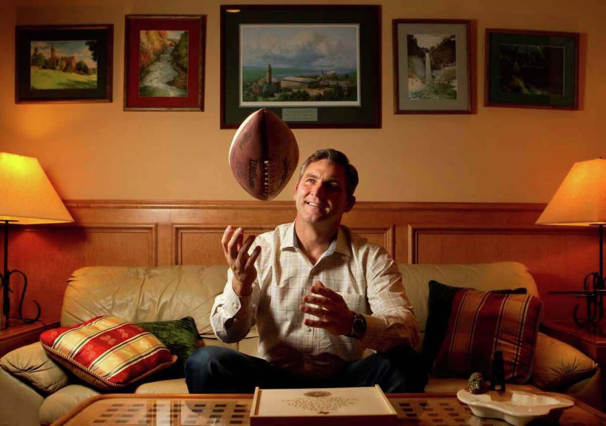 Craig James keeps his eye on the ball Friday at his father-in-law's home in The Woodlands. The former football star is now running for the U.S. Senate in Texas.